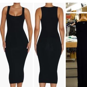 Naked wardrobe, black dress